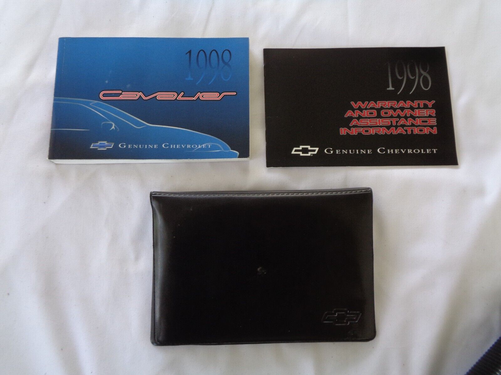 1998 CHEVY CAVALIER OWNERS MANUAL SET WITH CASE OEM FREE SHIPPING! - RarePartsFinder.Com