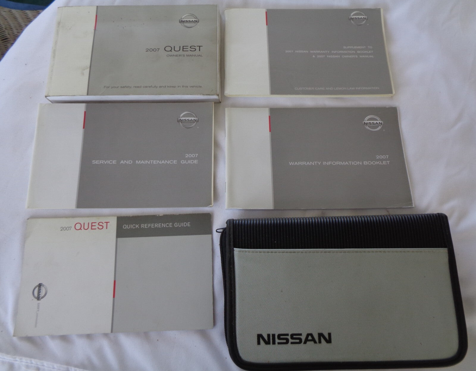 2007 NISSAN QUEST OWNERS MANUAL SET WITH CASE OEM FREE SHIPPING!