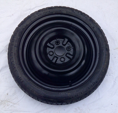 New Never Used 2004 - 2006 Scion XA OEM Emergency Donut Spare Tire T125/70D16