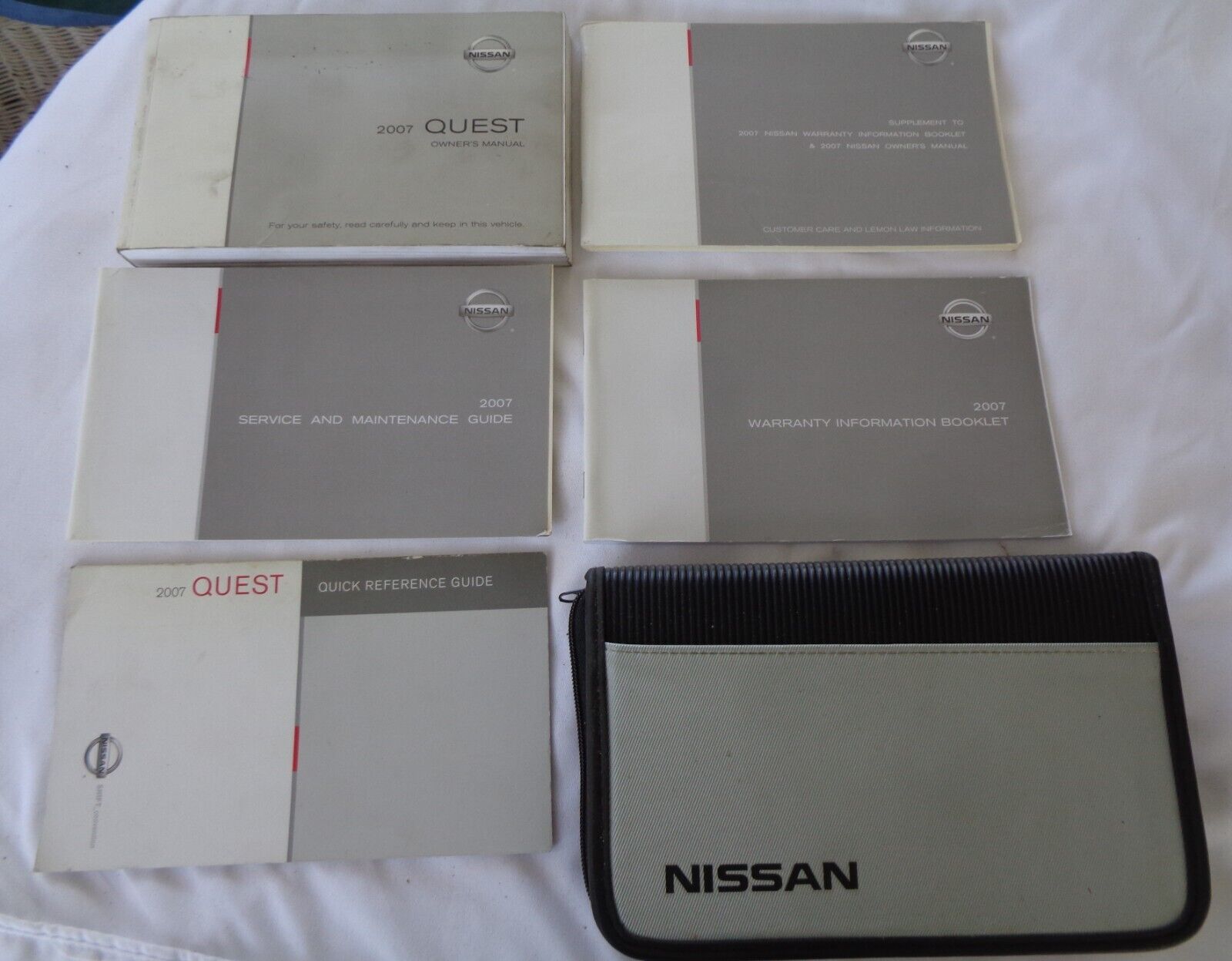2007 NISSAN QUEST OWNERS MANUAL SET WITH CASE OEM FREE SHIPPING! - RarePartsFinder.Com