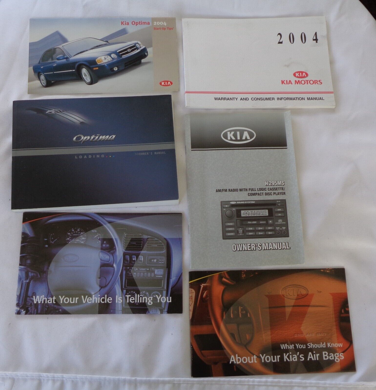 2004 KIA OPTIMA OWNERS MANUAL SET  WITH CASE OEM FREE SHIPPING! - RarePartsFinder.Com
