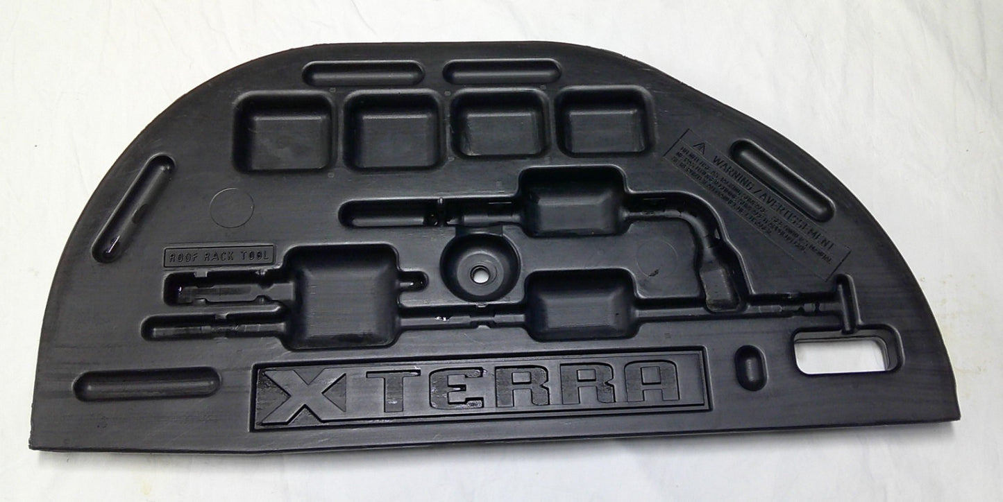 00 - 04 NISSAN XTERRA REAR FLOOR TOOL KIT P/N 84908-7Z00 GENUINE OEM (EMPTY) M2