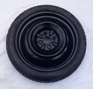 New Never Used 2004 - 2006 Scion XA OEM Emergency Donut Spare Tire T125/70D16